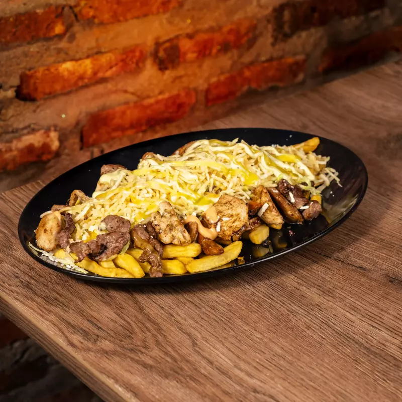 Salchipapa cuatro sabores