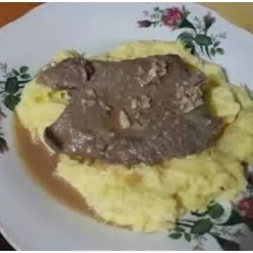 Pure con bistec