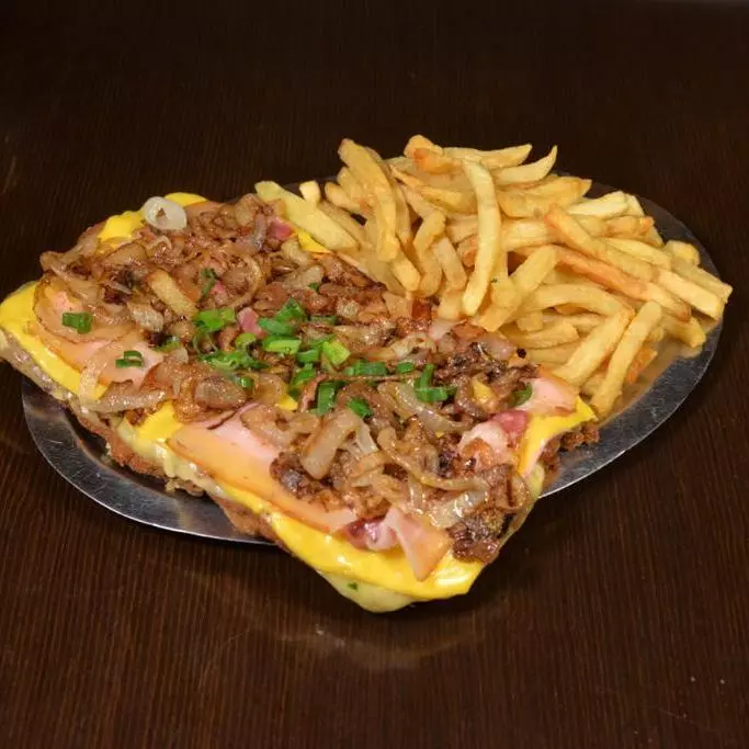 Milanesa 1/2 Costilla con Papas Fritas