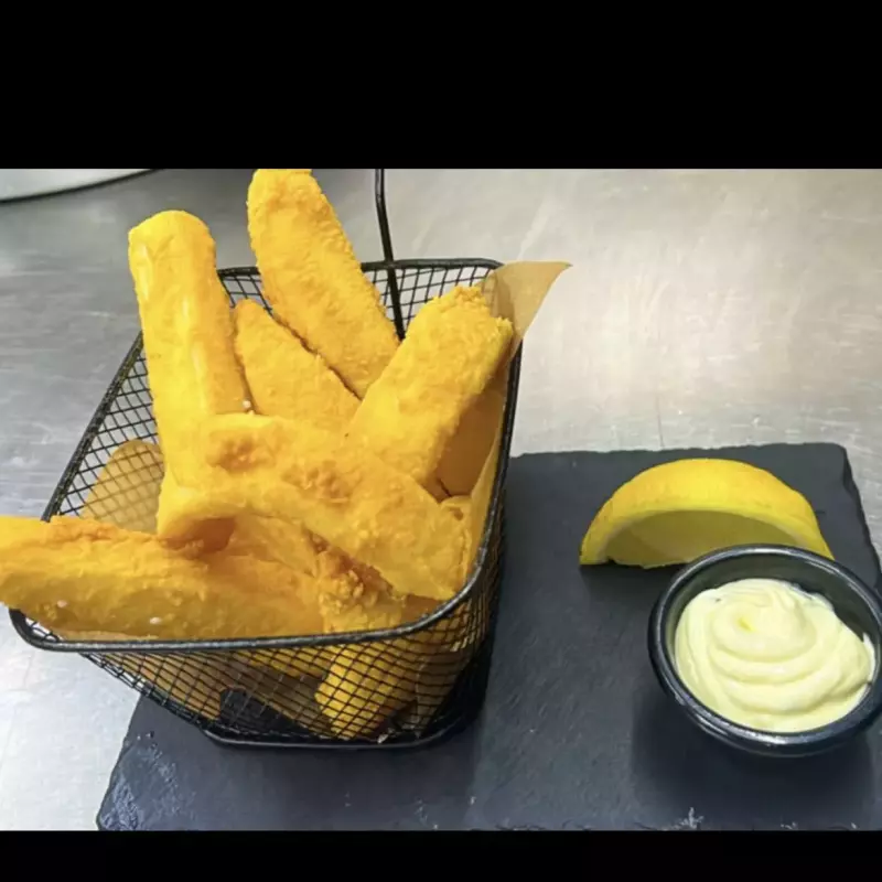 Choco Frito servido com arroz maland