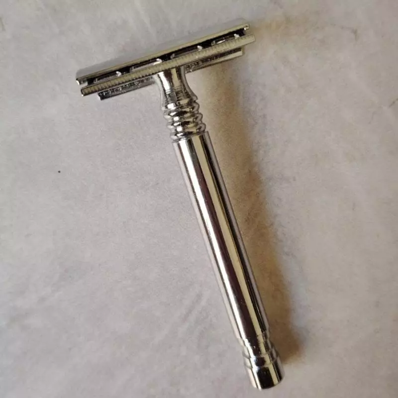 Maquina de afeitar de metal