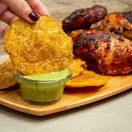 Pollo asado con patacon frito (1 per
