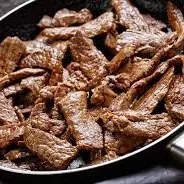 BIFE BOVINO EM TIRAS