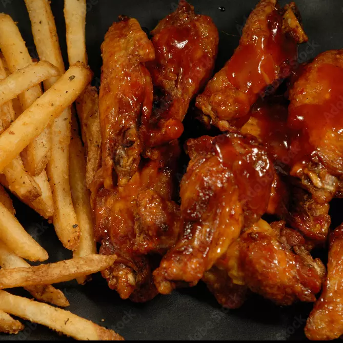 Alitas porción 08 und