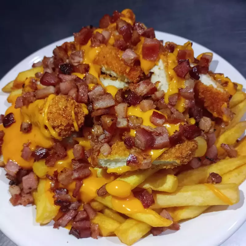 PAPA CON CHEDDAR ,BACON Y SUPREMITA