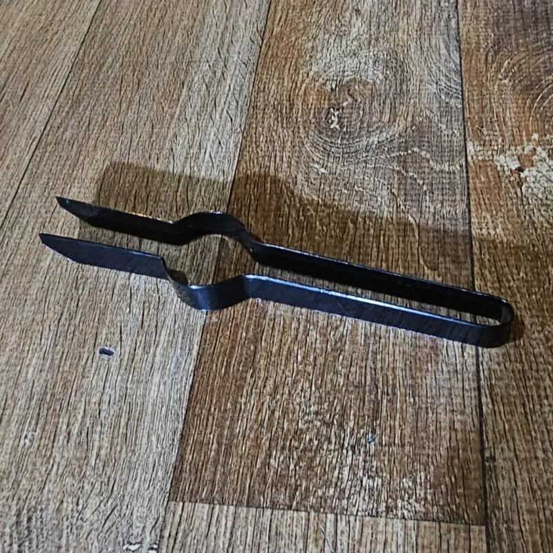 Pegador de Carvão Preto