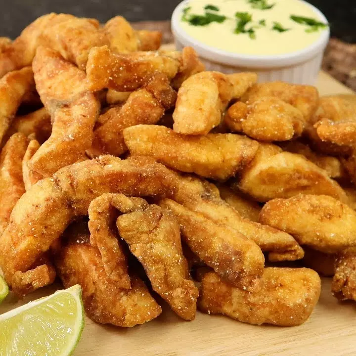 PORÇÃO DE TILÁPIA EMPANADA