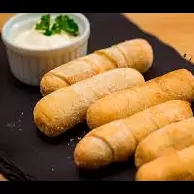 tequeños y lata stella