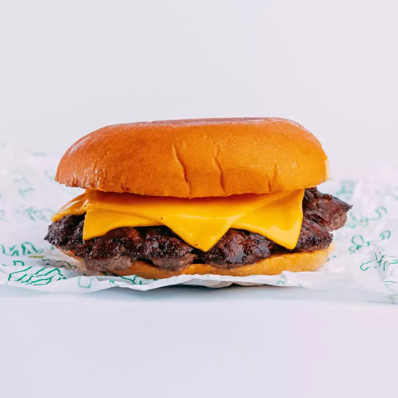 Cheese Burger + Papas fritas