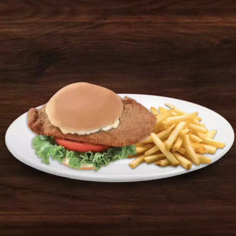 Milanesa al pan con papas fritas