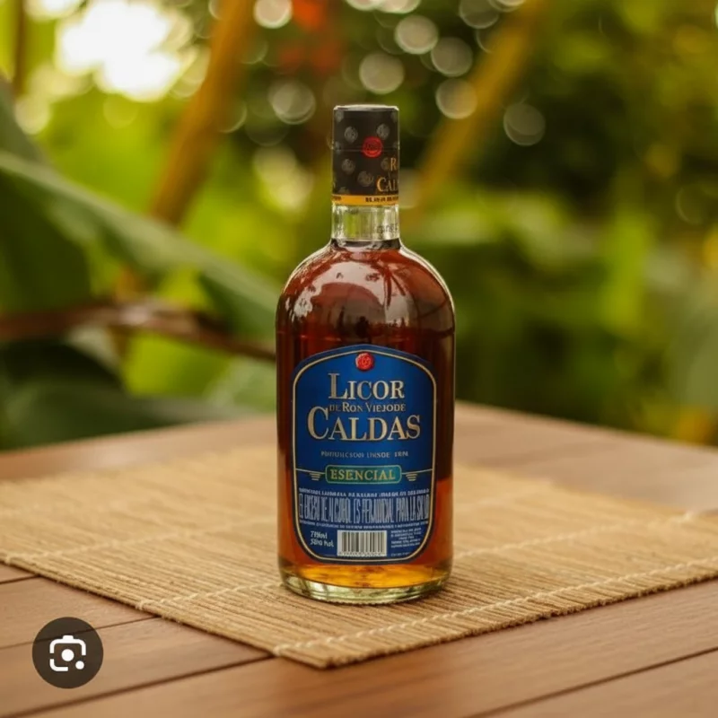 Botella ron caldas escencial