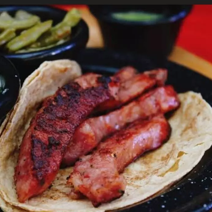 Taco de chorizo argentino