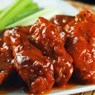 Alitas adobadas ½ kilo