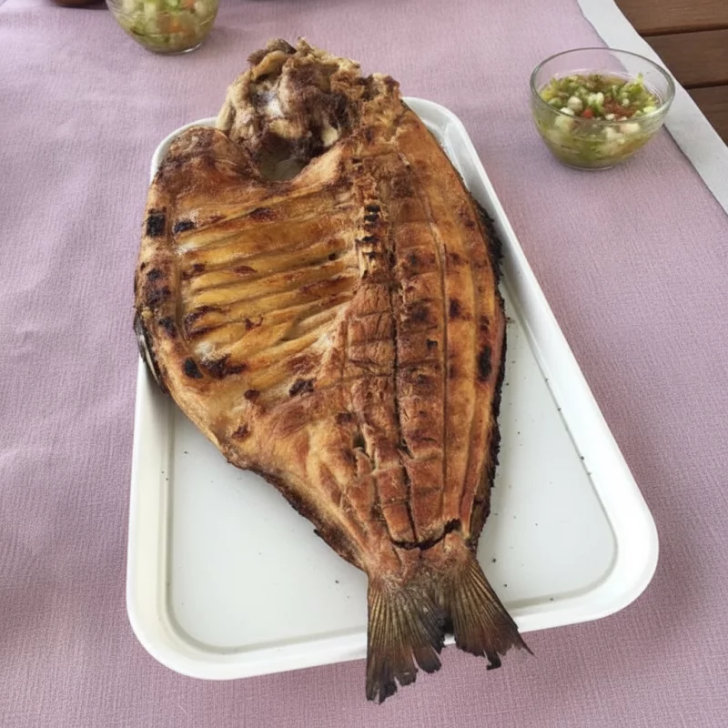 PEIXE ASSADO NA BRASA