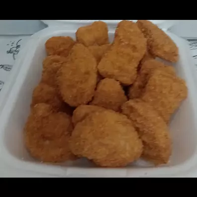 25 Nuggets frango + Coca Lata 350ml