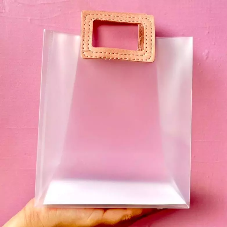 Bolsa opaca pequeña manija cuero