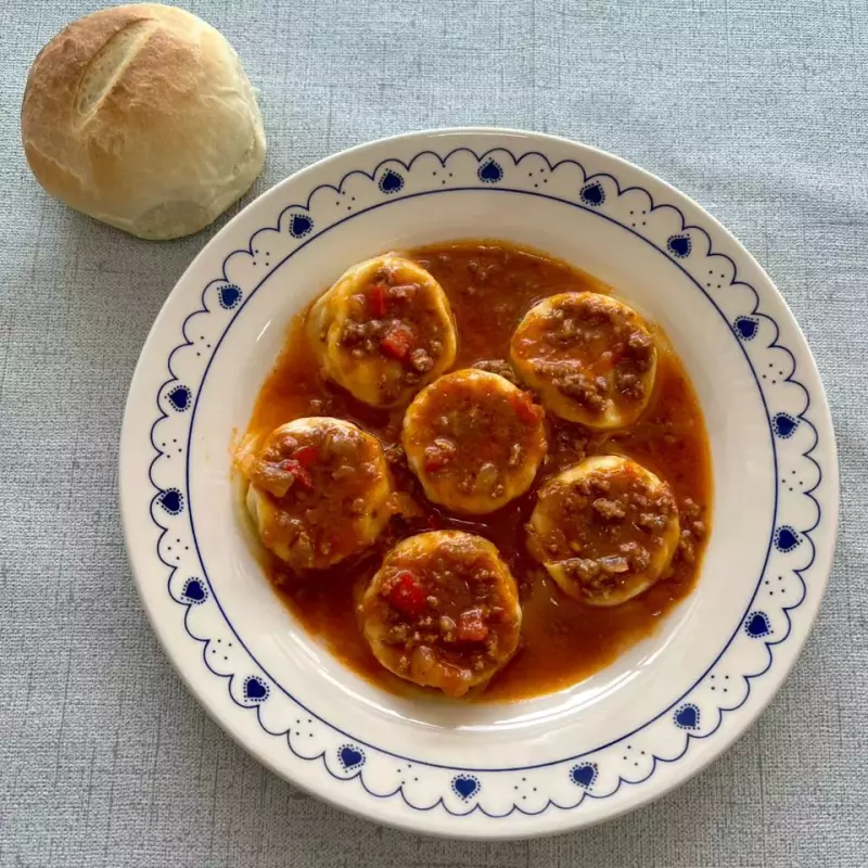 Sorrentinos con salsa bolognesa