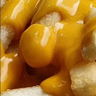 PAPAS FRITAS con CHEDDAR