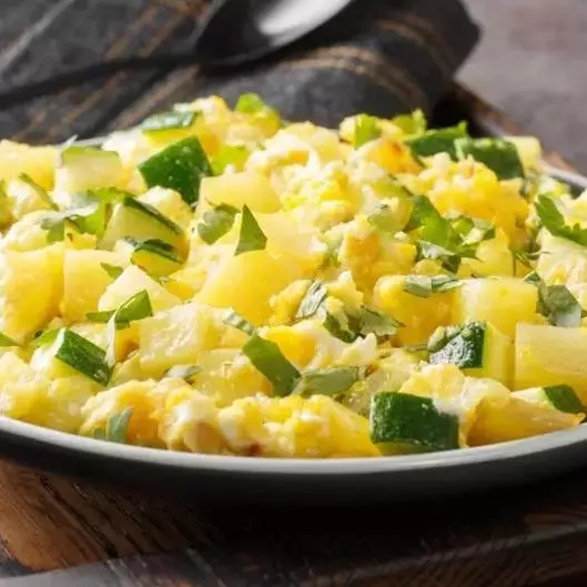 Gratin de ovos, palmito com parmesão