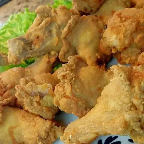Porção Filé de frango frito 190g