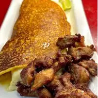 Cachapa con cochino frito