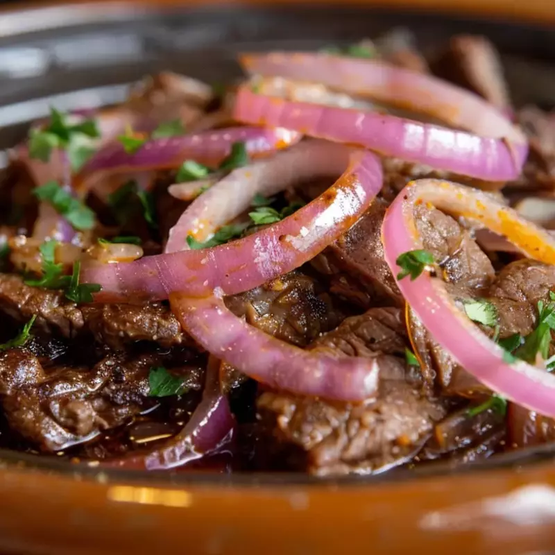 Carne Encebollada