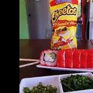 63. CHETOS FLAMING HOT ROLL