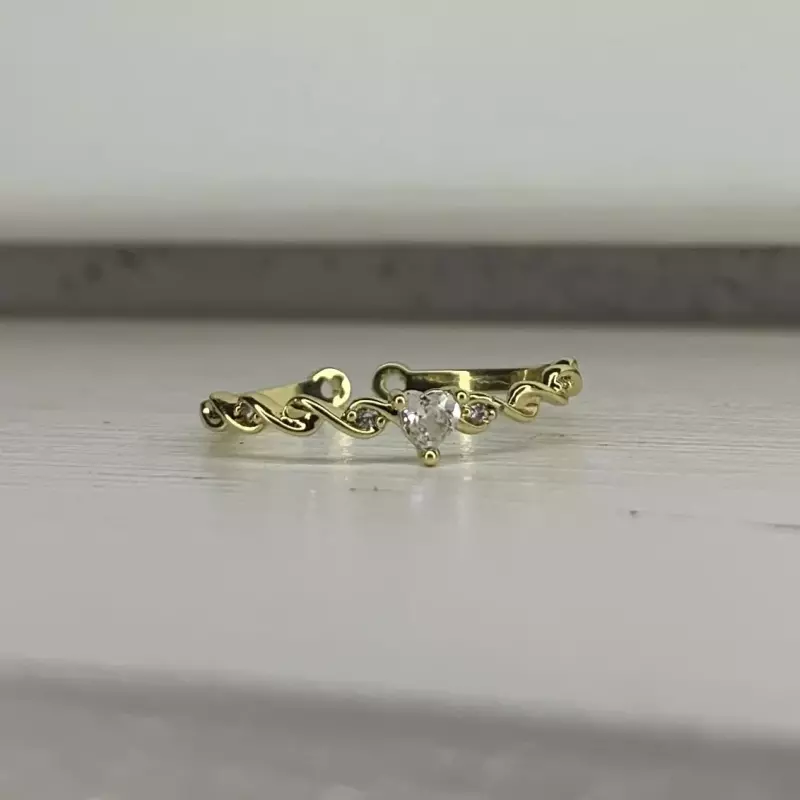 Anillo corazon cruzado