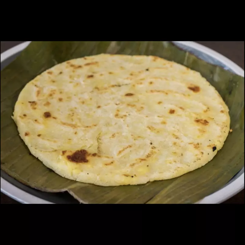 Tortilla aliñada con queso