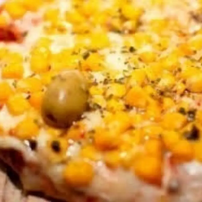 • Pizza de Choclo