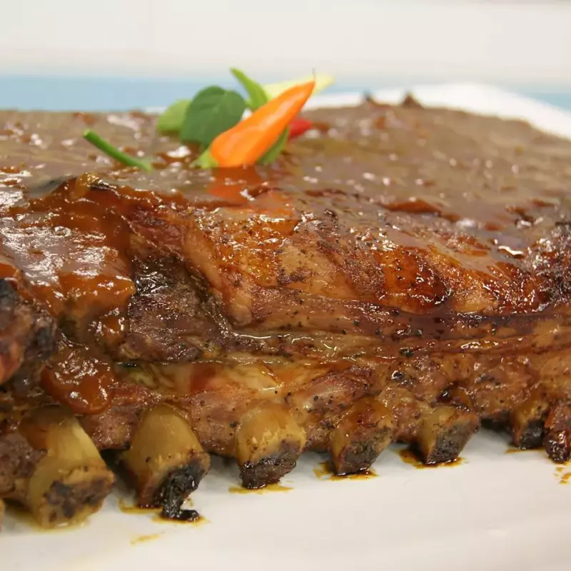 Bode assado na brasa