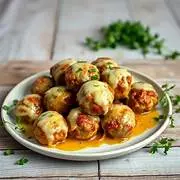 Almondega ao molho com queijo