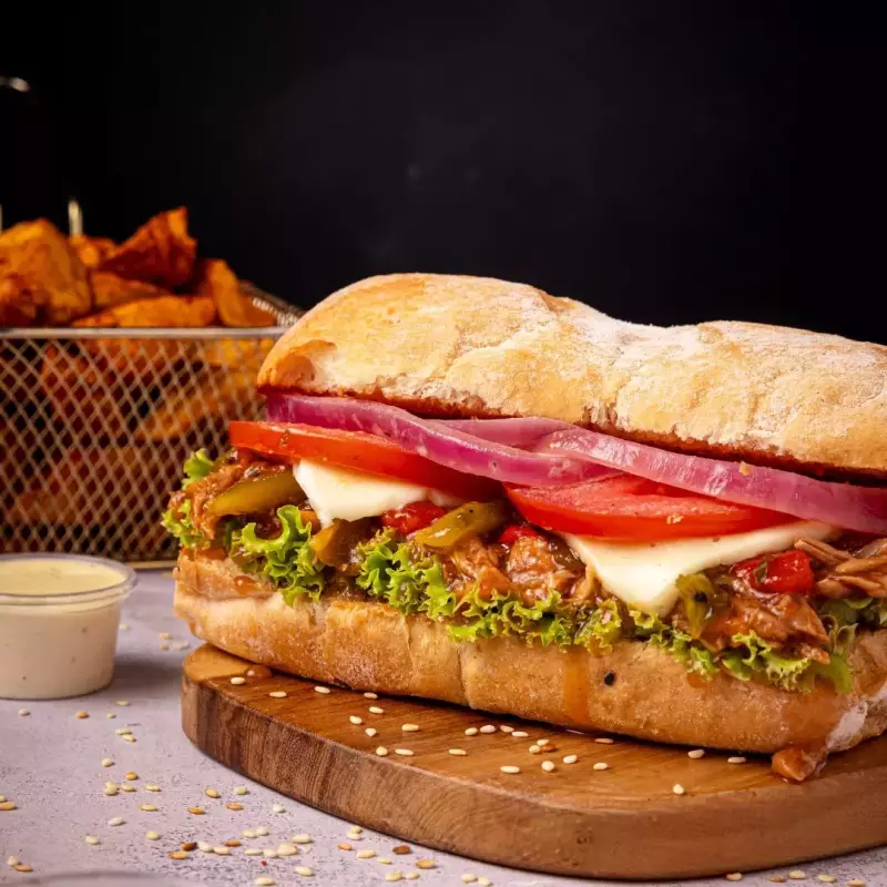 Sándwich de cerdo +papa artesanal