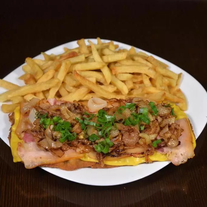 Milanesa 1/2 Costilla con Papas Fritas
