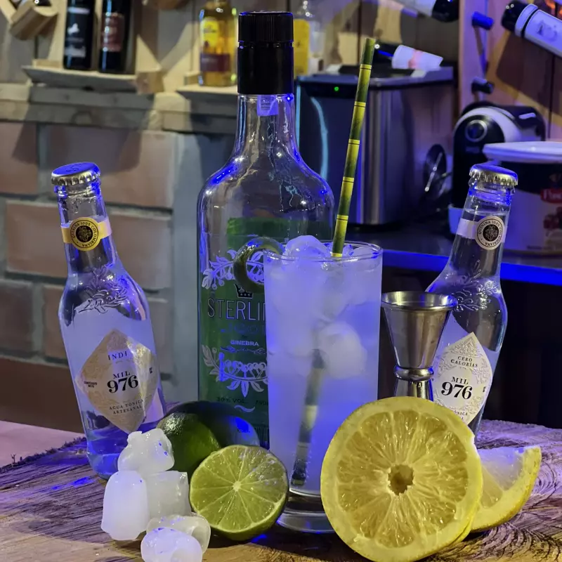 TOM COLLINS
