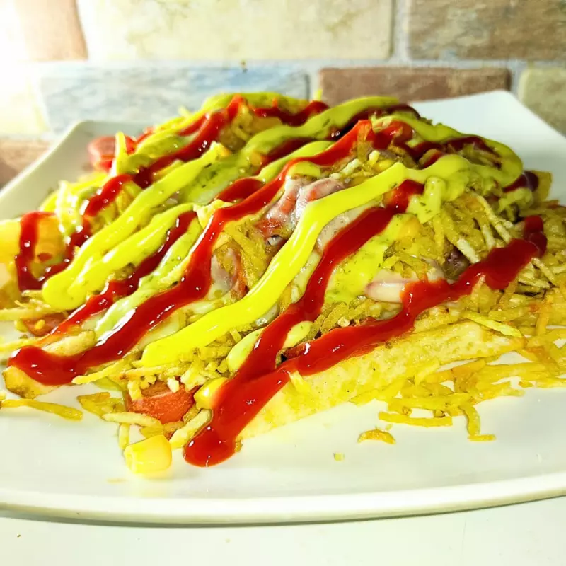 Salchipapa Gratinada