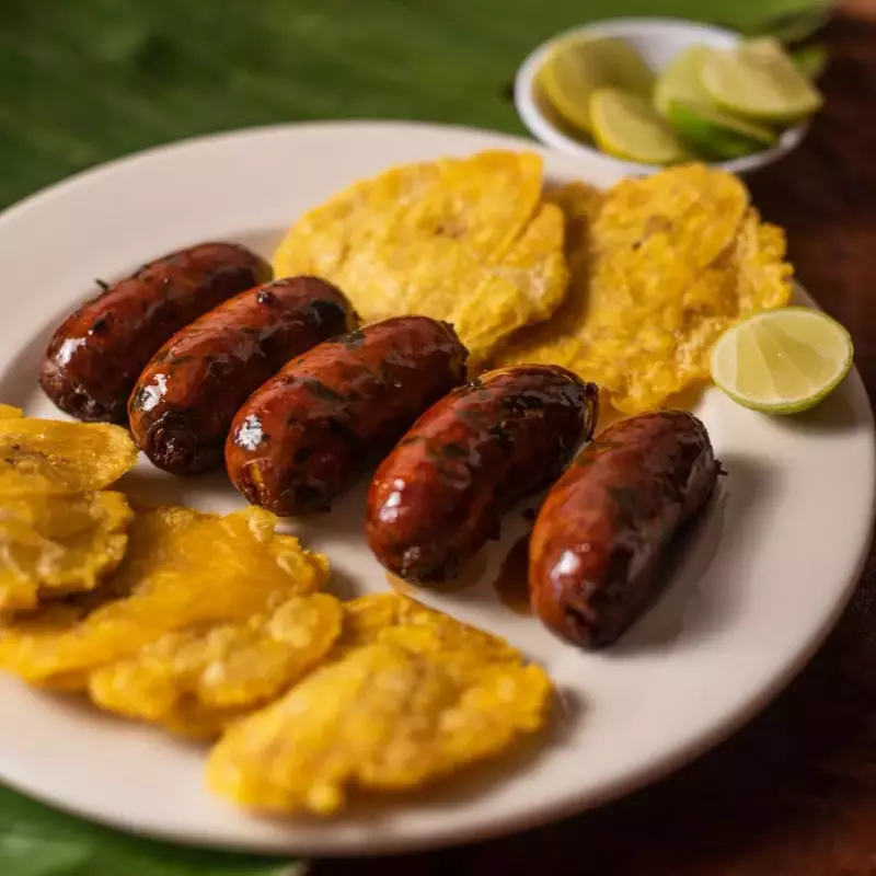 PORCION DE CHORIZO EN COCA-COLA - X5