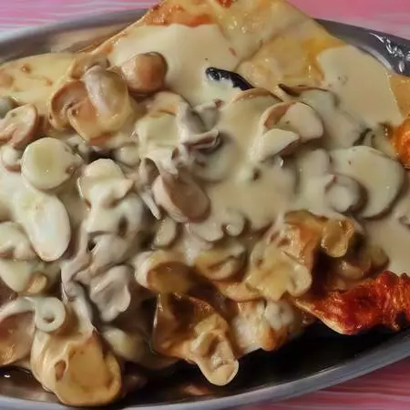 Bifinhos de Peru com Cogumelos