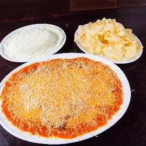FILET À PARMEGIANA COM MOLHO BATIDO