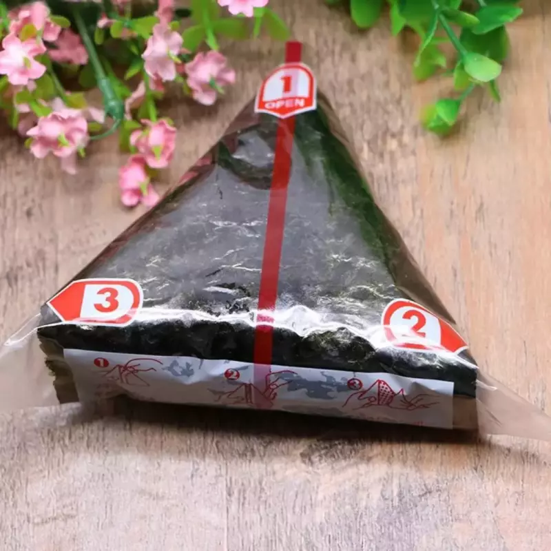 ONIGUIRI COM EMBALAGEM PROTETORA