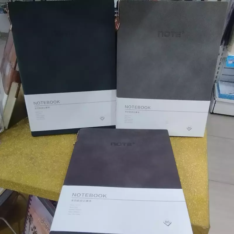 Notebook con bolígrafo incluído