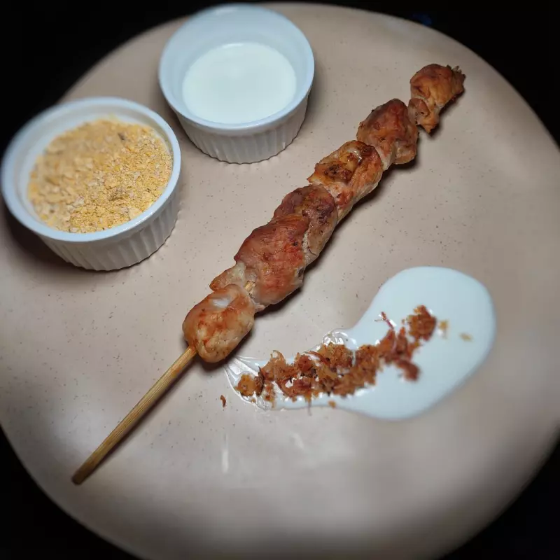 Espetinho de pernil