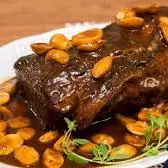 Lagarto ao molho de champignon