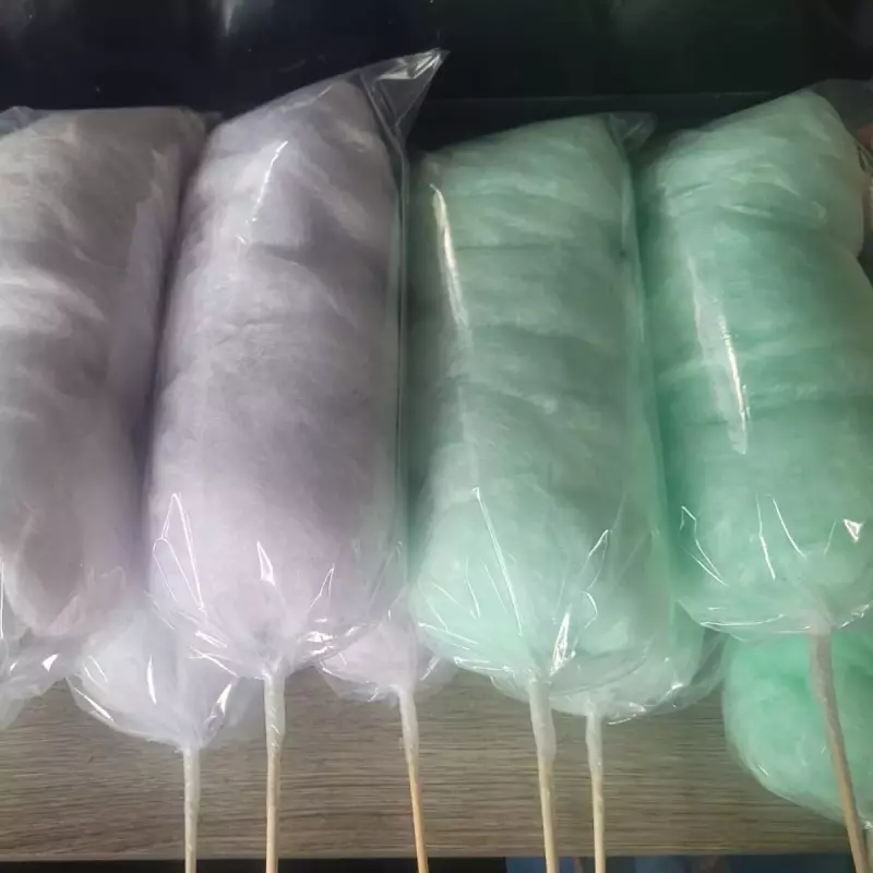 Algodão doce no palito $3,50 a und