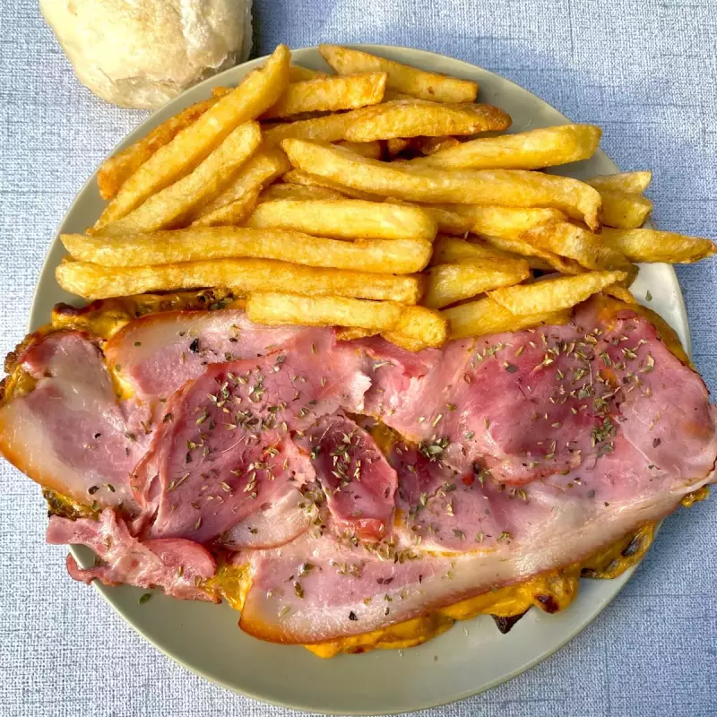 Mila de panc y cheddar con fritas