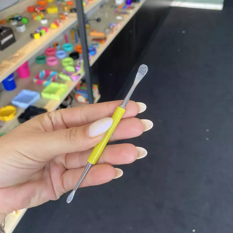 Espátula extração