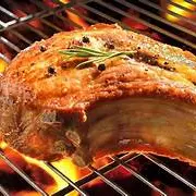 Carneiro assado na brasa