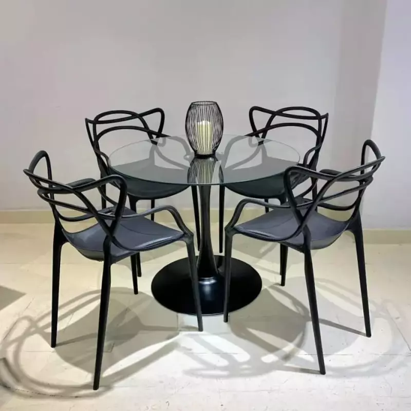 Mesa tulip vidrio 90cm+4 sillas M.