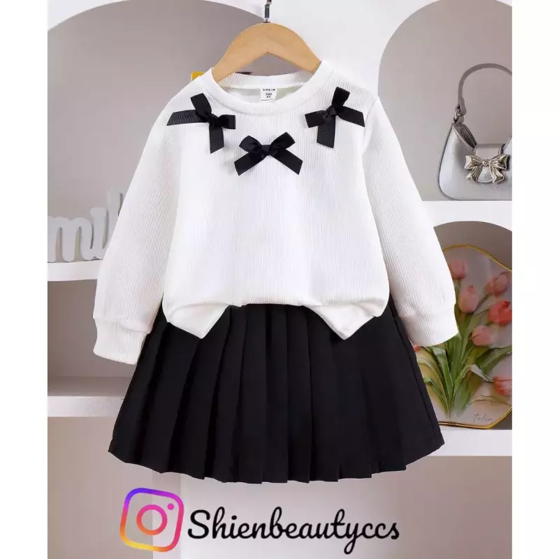 Falda y sueter de Lazos