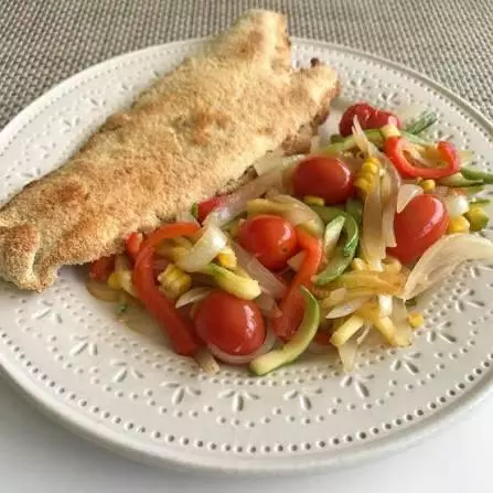 Milanesa con tomate
